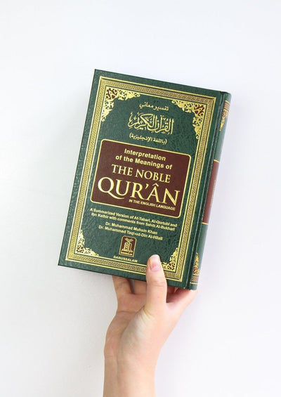 The Noble Qur'an in Arabic and Interpretation in the English Language